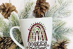 red and green rainbow illustration with quote saying merry christmas on a white mug