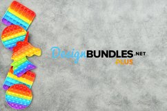 Colorful template toys pop it on grey stone background