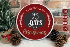 Countdown to Christmas text with chalkboard frame shown on a red round sign