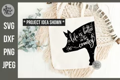 Life is Better in the Country Quote inside a pig on a tote bag as a cricut or silhouette vinyl project example.   Available in SVG, PNG, DXF, and JPEG format.