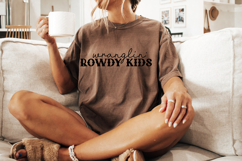 Trendy “Wranglin’ Kids” SVG design for creating custom shirts and accessories.