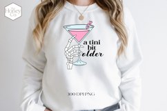 Tini Bit Older Sublimation | Birthday Skeleton Hand Martini Product Image 1