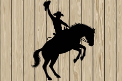 Cowboy riding a horse silhouette SVG Product Image 1