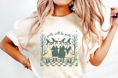 Illustration of four geese dressed as witches in cozy fall dresses, standing in a woodland clearing surrounded by mushrooms, stars, and twigs. One goose holds a sunflower. Warm earthy tones and whimsical style.