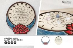 This crystal grid laser cut design is made with 2 layers. The base has an engraved part with the flower of life and moon phases around it. The top layer is featuring a lotus flower with crescent moon.