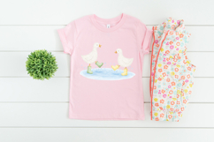Farm animal PNG showing two geese splashing water, designed in a gentle watercolor look ideal for children’s printables and nursery art.