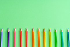 School and office supplies on office table, green background Product Image 1