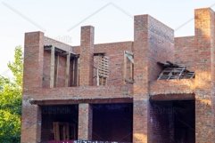 family brick house under construction in summer nobody. Product Image 1