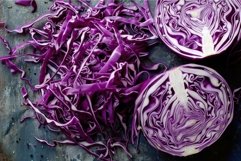Freshly shredded purple cabbage on dark rustic table Product Image 1