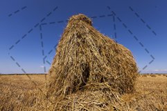 stack of straw in the field Product Image 1