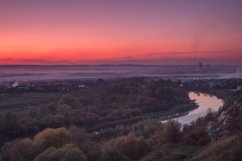 Sunset in the mountains view on the old city with the river	 Product Image 1