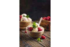 Summer ice cream with raspberry and mint on the wooden table Product Image 1