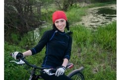 Young woman with bike Product Image 1
