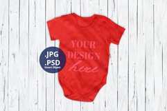 Red Baby Bodysuit Mockup on Removable Minimalist Background Product Image 1