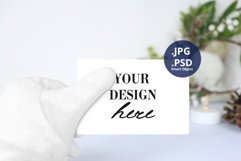 Santa holding Driver's License mockup, White Santa's glove Product Image 1