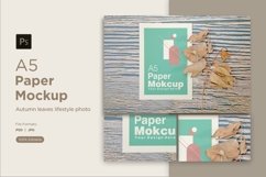 A5 Paper Mockups with dry leaves on wooden background Product Image 1