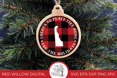 Delaware Christmas design with buffalo plaid displayed on a wooden ornament hanging from a Christmas tree.