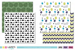 Dinosaur scrapbook papers with prehistoric characters and coordinating patterns