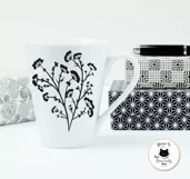 black dry weeds outline drawing on a white mug