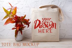 Rustic tote bag mockup with red grass in the vase Product Image 1