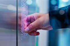 Businessman scanning fingerprint on futuristic digital panel Product Image 1