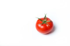Red tomato on a white background Product Image 1