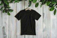 Black T-shirt Mockup on wooden background Product Image 1