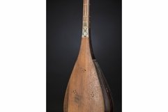 Part ancient Asian stringed musical instrument on black Product Image 1