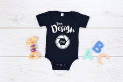 Black Bella Canvas 100B MockUp One Piece Flat Lay Bodysu Product Image 1