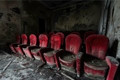 Abandoned dusty cinema showing no longer showing films Product Image 1