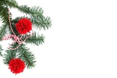 Christmas decorations red pompons and christmas tree branc Product Image 1