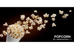 Popcorn in cardboard box isolated on black background Product Image 1