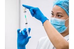 Doctor prepares a syringe with an injection, close-up Product Image 1