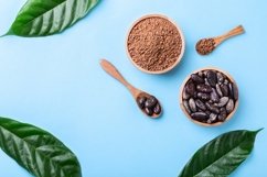 Cacao powder and whole cacao beans on blue. Food frame. Product Image 1