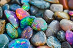 Closeup of vibrant multicolored opal stones with iridescent Product Image 1