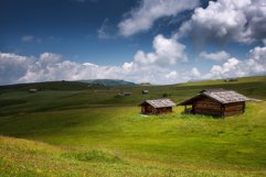 Cottages and clouds at Seiser Alm Product Image 1