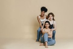 Multiethnic women on beige background with copy space Product Image 1