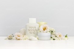 Cosmetics mockup with white flowers, bottle contain Product Image 1