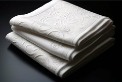 Elegant embossed white towel stack on dark background Product Image 1