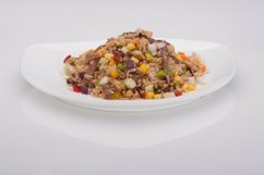 Salad in a white plate on a white background Product Image 1