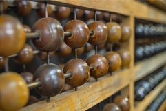 Old wooden abacus showing the concept of calculating Product Image 1