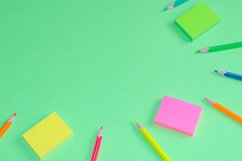 School and office supplies on office table, green background Product Image 1