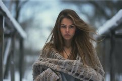 Winter portrait of young woman in snowy setting Product Image 1