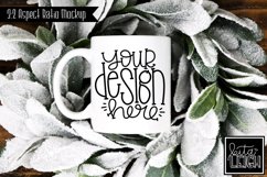 11 oz Mug Mockup with Snowy Wreath | Stylized Photo Product Image 1