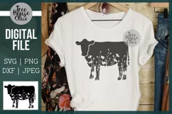 Floral Cow SVG Digital Files features wildflowers inside a cow silhouette.  Example of a finished product is shown; a floral cow silhouette on a white western styled t shirt