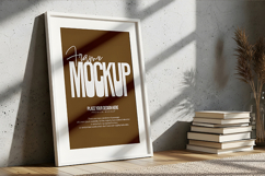 Leaning Frame Mockup with Books and Shadow Play Product Image 1