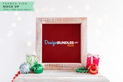 mockup of red framed christmas sign