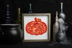 framed layered papercut pumpkin with cauldron