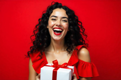 A red satin gift bow with golden edges on a black background Product Image 1