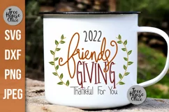 Friendsgiving 2022 with wreath Thankful For You SVG shown on a white camping mug as a project idea.  Thanksgiving with friends SVG, DXF, PNG, and JPEG file types included.